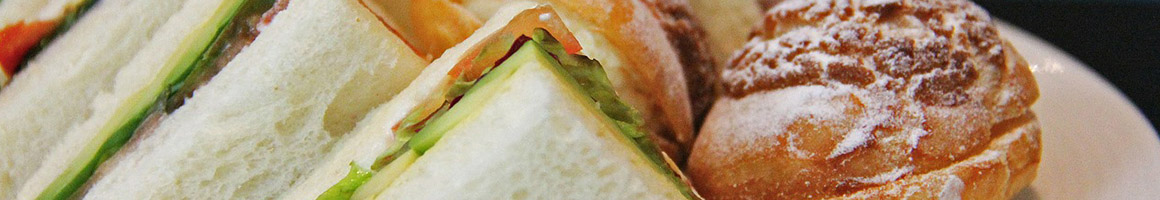Eating Middle Eastern Sandwich at Sunrise Pita & Grill restaurant in Sunrise, FL.